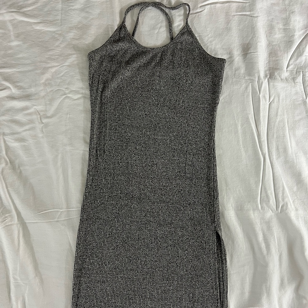 Poetry mini dress. Grey. Figure hugging. Cross spaghetti straps. Front leg slit.